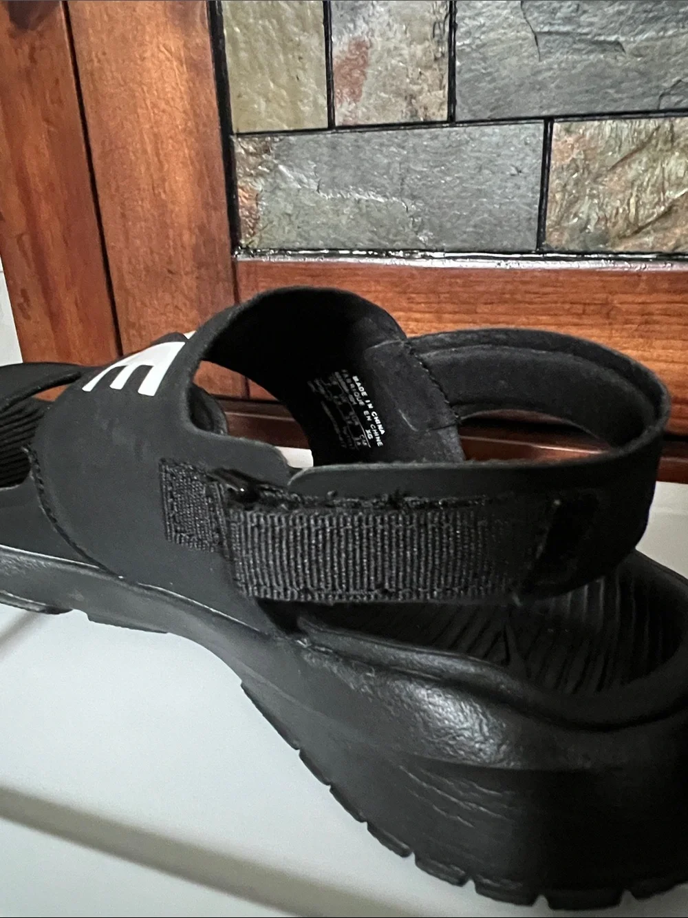 Nike Black Sandal-Strap Slide with White Logo